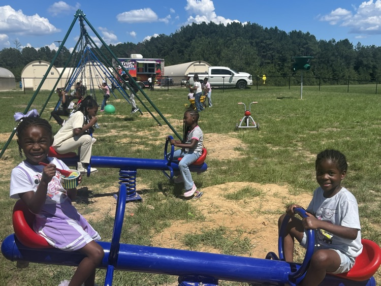 picture of students in a playground toy