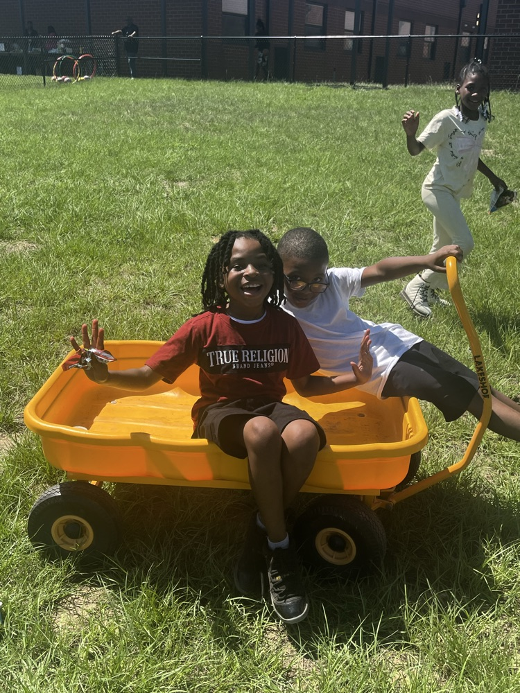 picture of students in a wagon