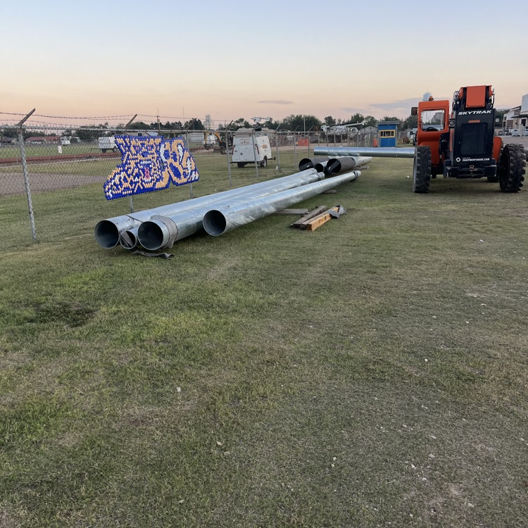 light poles being installed