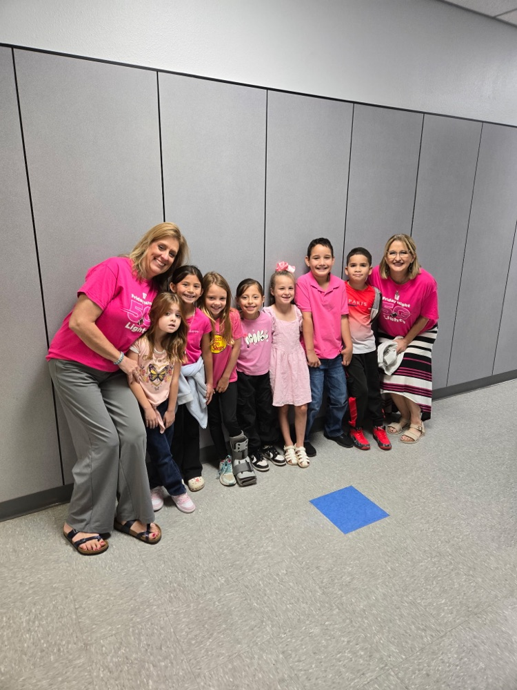 students dressed in pink