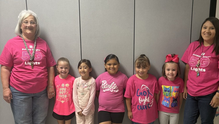 students dressed in pink
