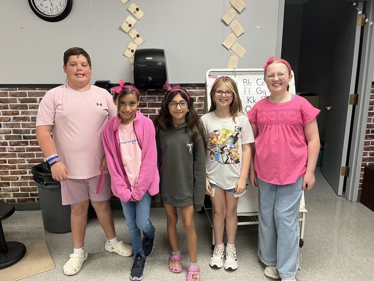 students dressed in pink