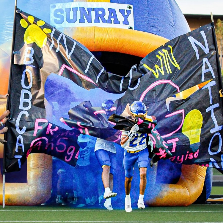 bobcats run through sign