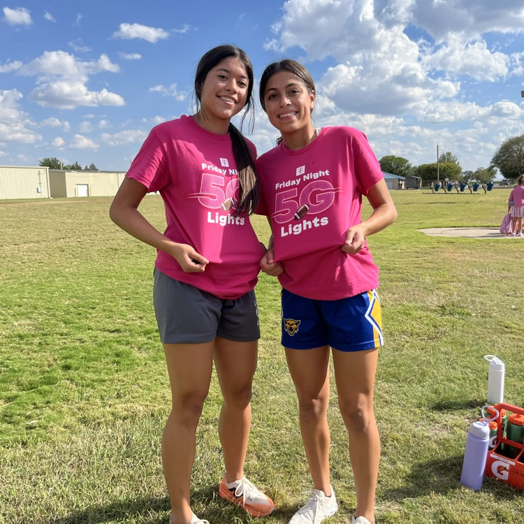 T-Mobile Tuesday girls showing their shirts 
