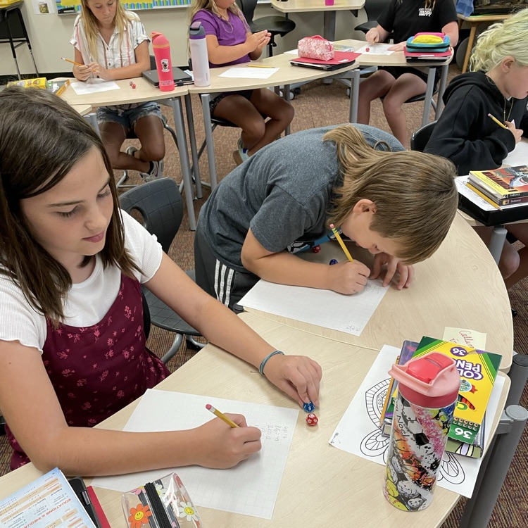 working with partners on multiplication facts 