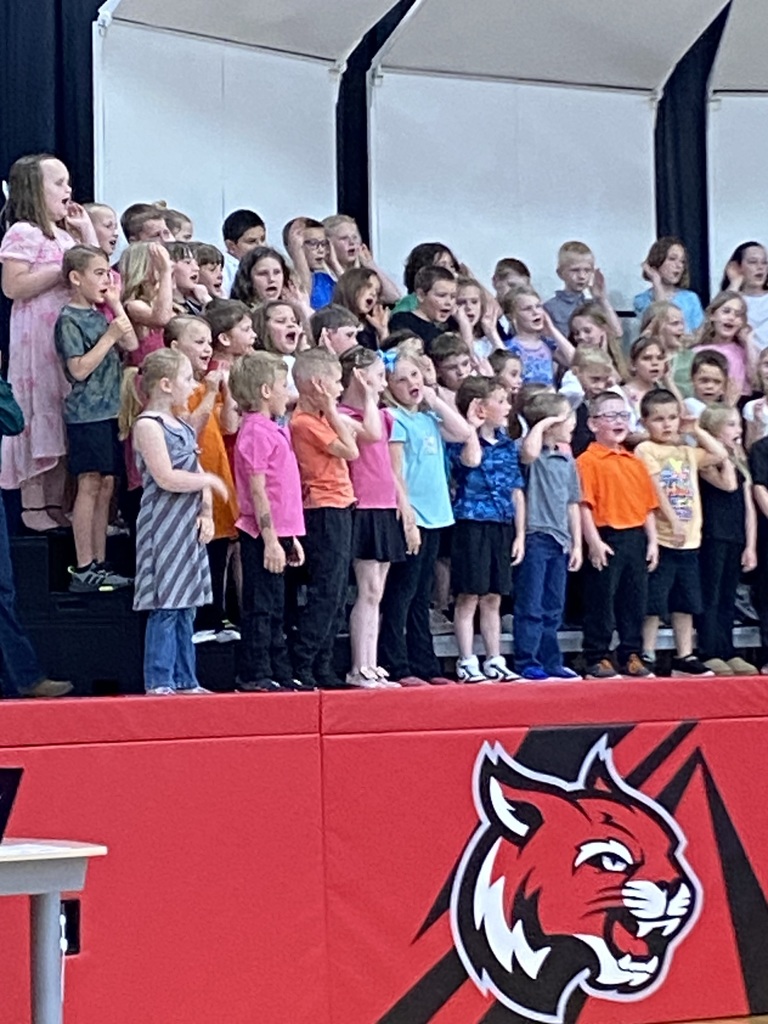Kindergarten, 1st and 2nd graders singing "The Blues"