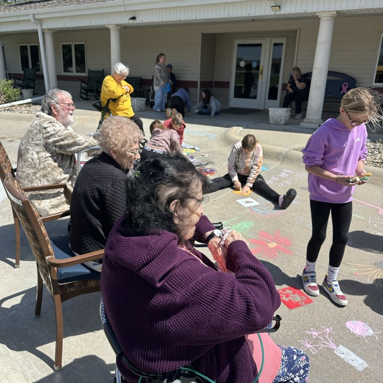 Enjoying time watching students color