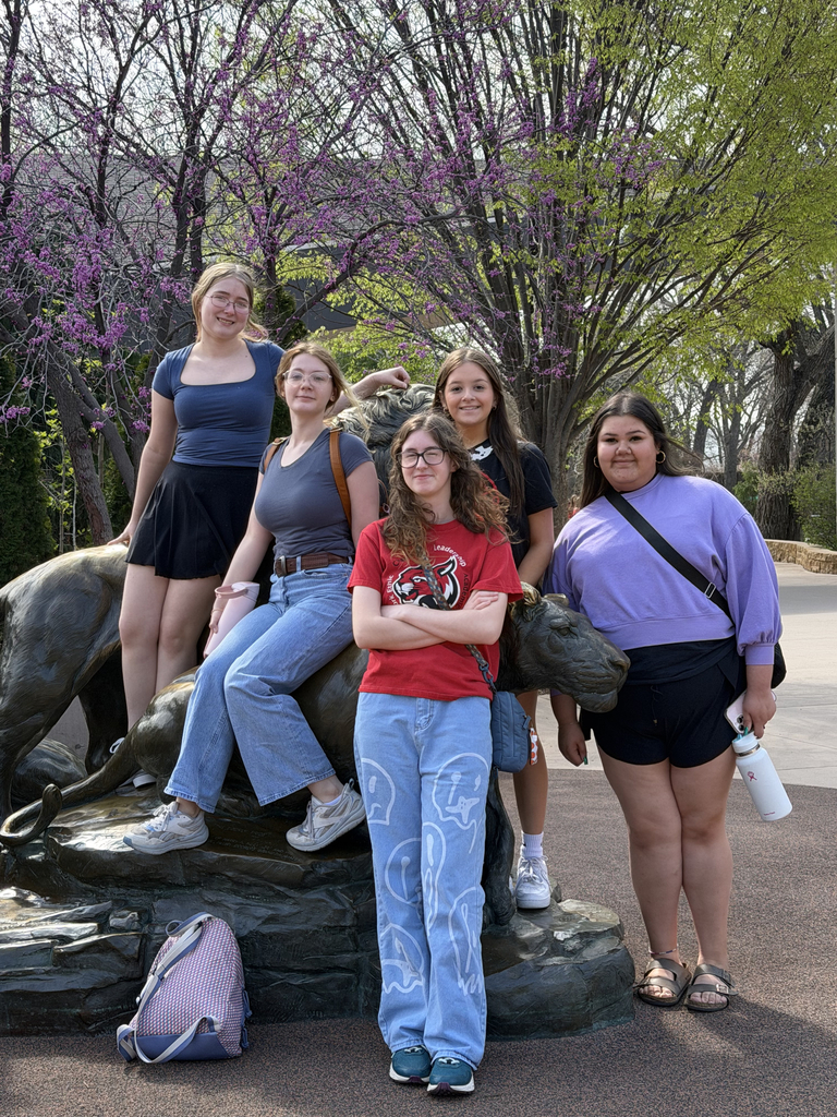 Art Club Members With Front Statue