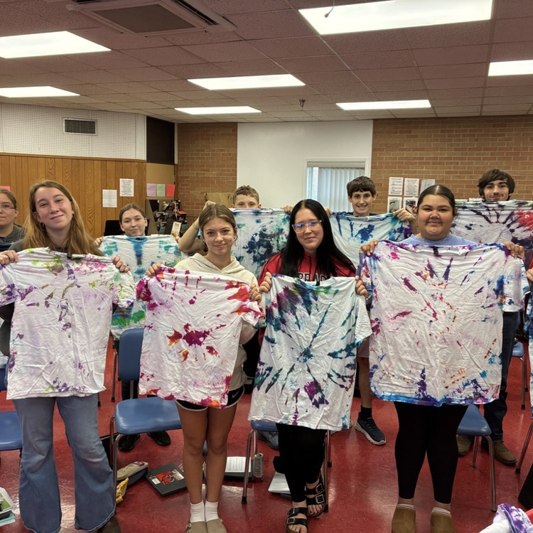group photo with finished shirts 