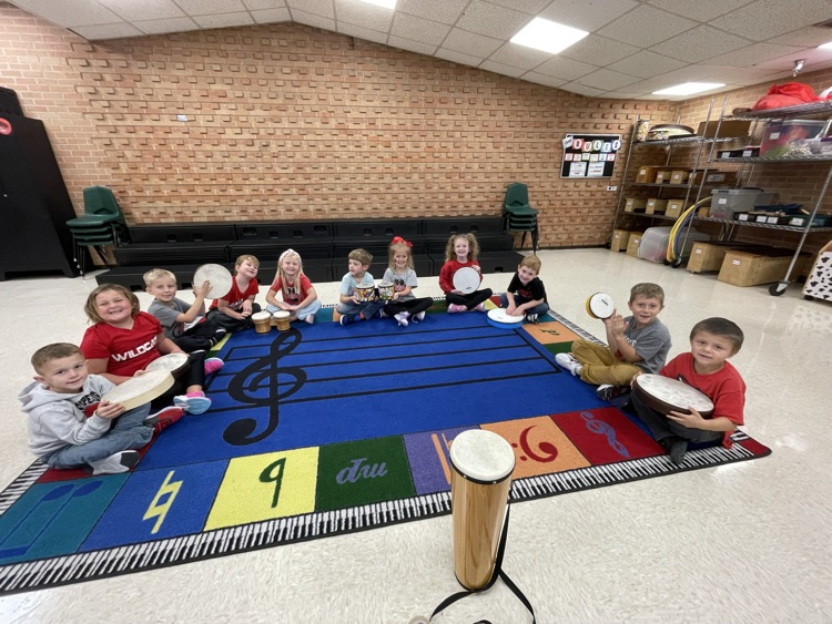 KA showing off their hand drums and bongos.