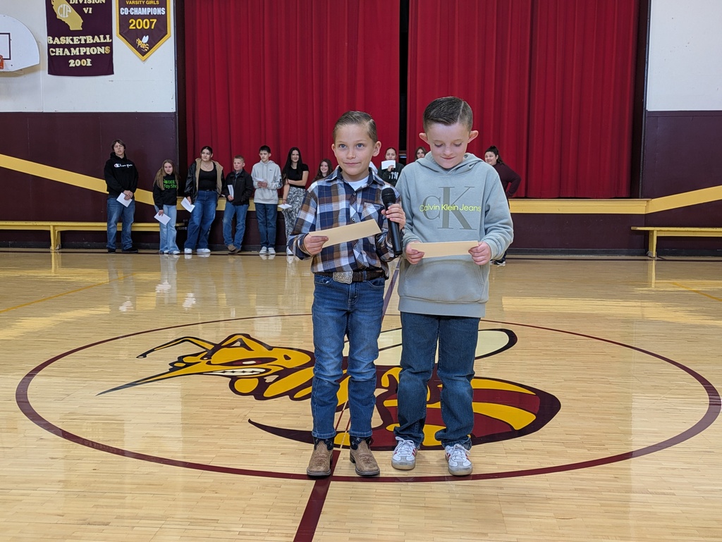 Kayne & Estavahn leading the Pledge of Allegiance