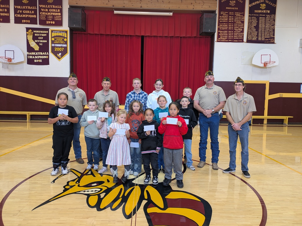 Coloring and Writing winners with VFW members.