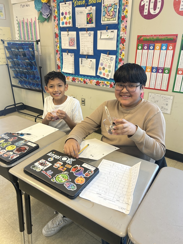 Mrs. Custodio's fifth grade math students celebrated completing their Fractions Unit and Valentine's Day by enjoying a delicious yogurt parfait.