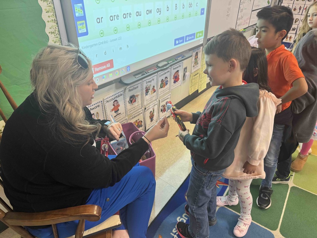 Today, our Kindergarten students had a visit from Essie Raye’s mom, Nicole Moser. Nicole is a dental hygienist. She taught them about how to take care of their teeth.