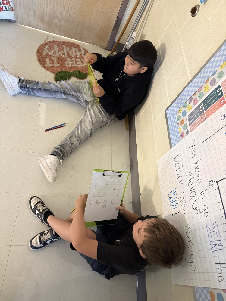 students playing Battleship