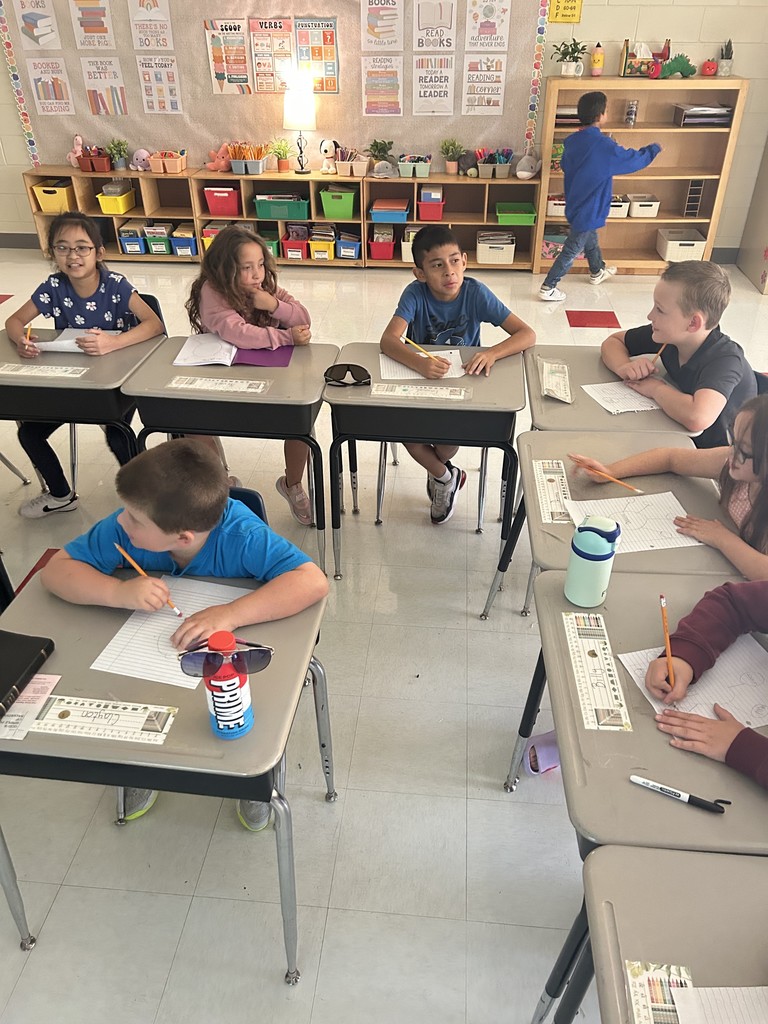 students workiing on their community projects
