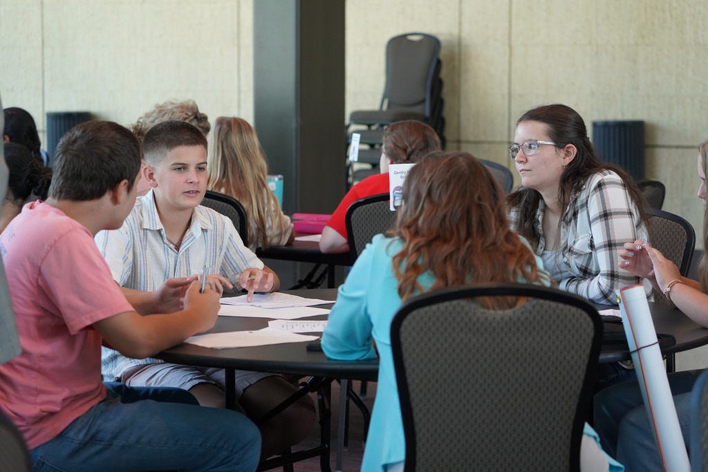 GMS team brainstorms at their table