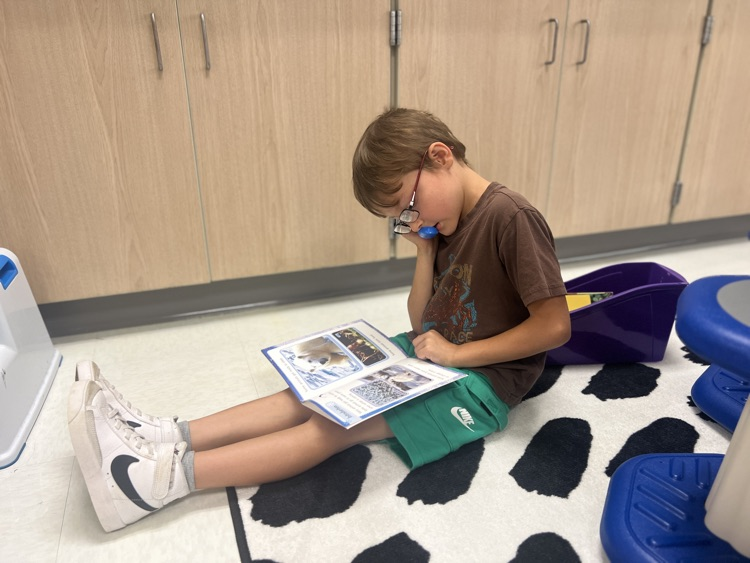 student reading a book