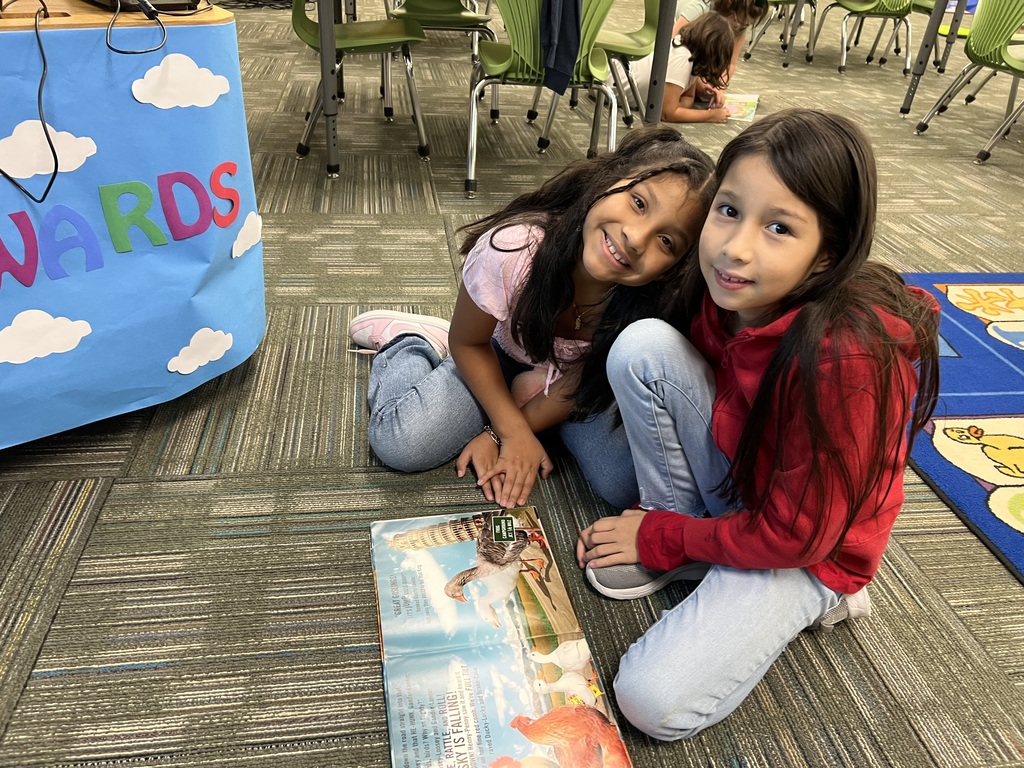 students working together to find characteristics of Fairy Tales. 