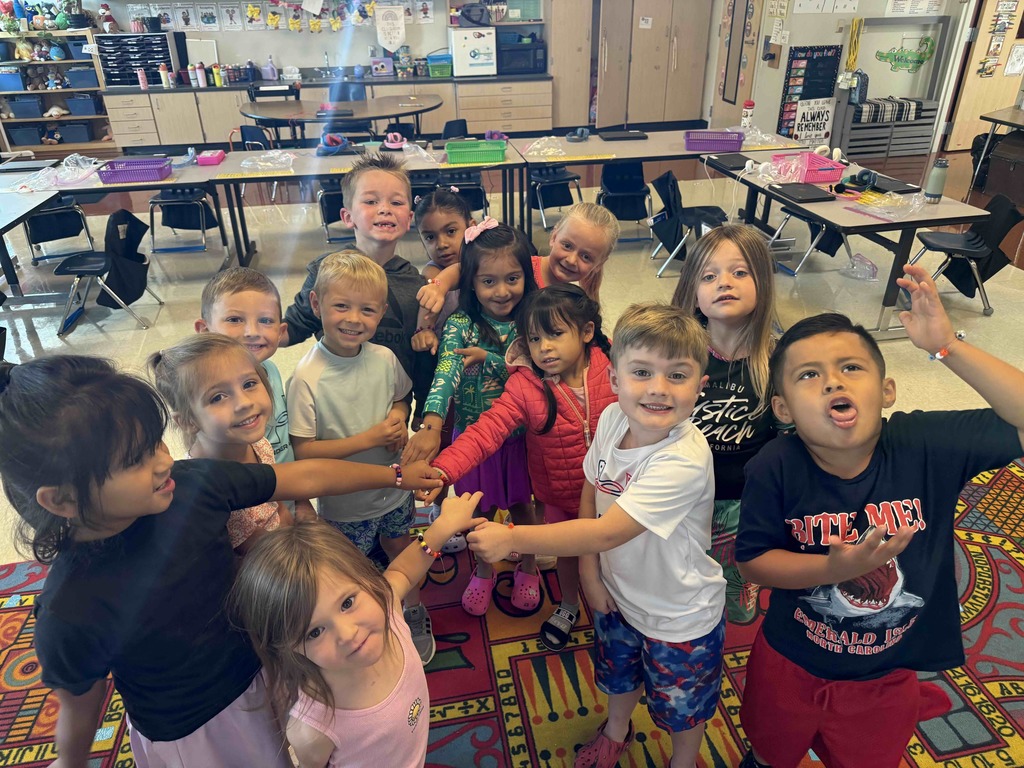 Kindergarten students have been learning how to be a good friend. Today, they made friendship bracelets together as a team-building activity.