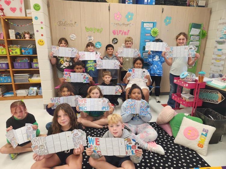 students showing off their foldables