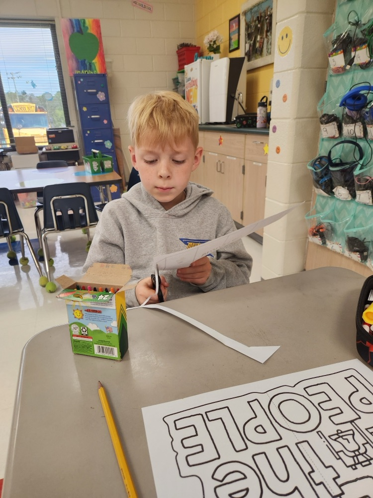 students working on their foldables