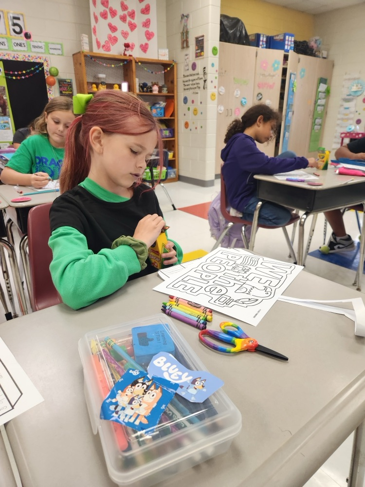 students working on their foldables