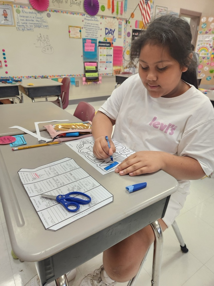 students working on their foldables
