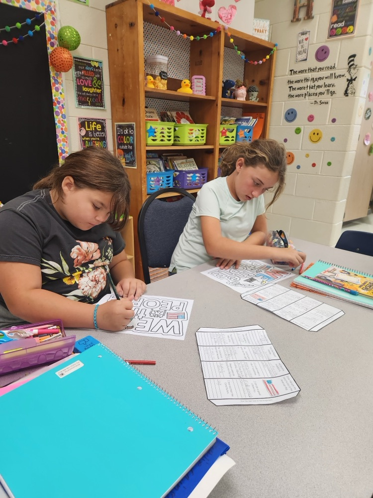 students working on their foldables