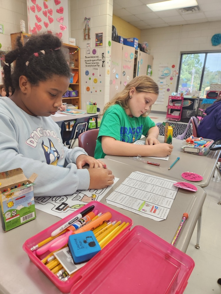students wearing green