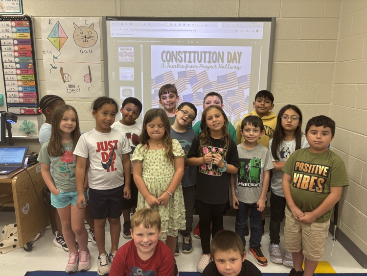 students wearing green