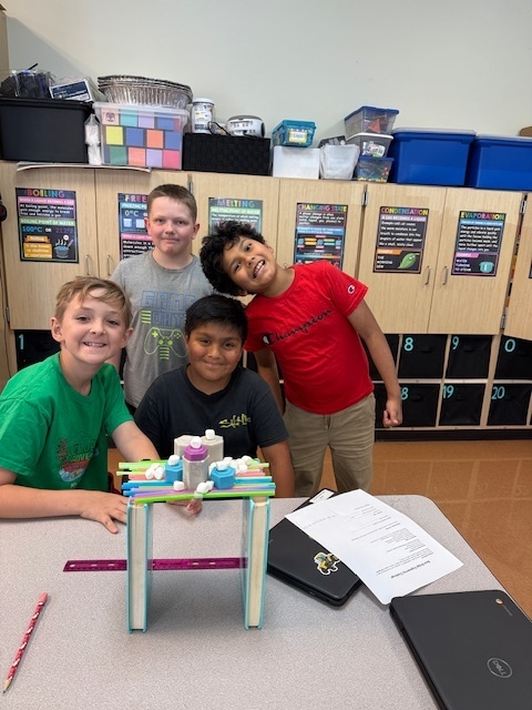 Our fifth graders were up to the challenge of building a bone bridge that would hold 200 grams and span 15-20 centimeters!  