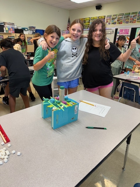 Our fifth graders were up to the challenge of building a bone bridge that would hold 200 grams and span 15-20 centimeters!  