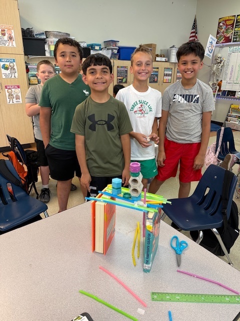 Our fifth graders were up to the challenge of building a bone bridge that would hold 200 grams and span 15-20 centimeters!  