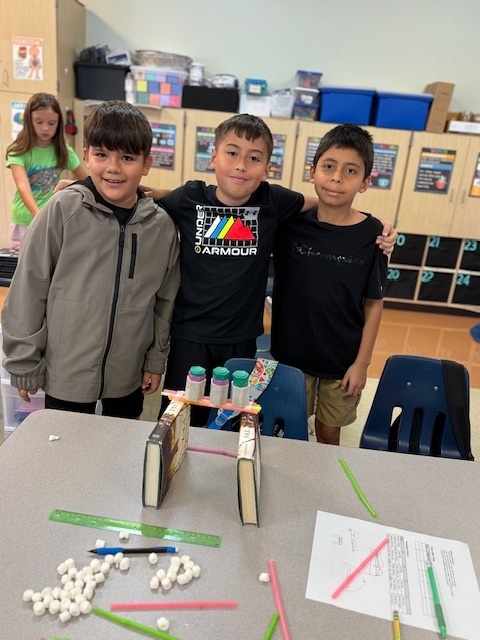 Our fifth graders were up to the challenge of building a bone bridge that would hold 200 grams and span 15-20 centimeters!  