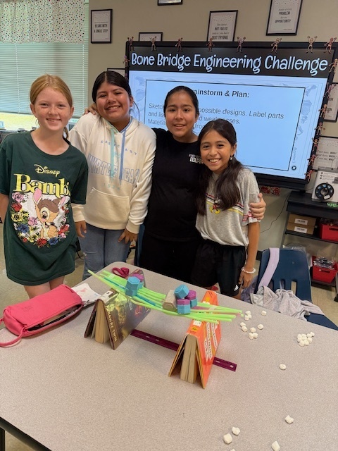 Our fifth graders were up to the challenge of building a bone bridge that would hold 200 grams and span 15-20 centimeters!  
