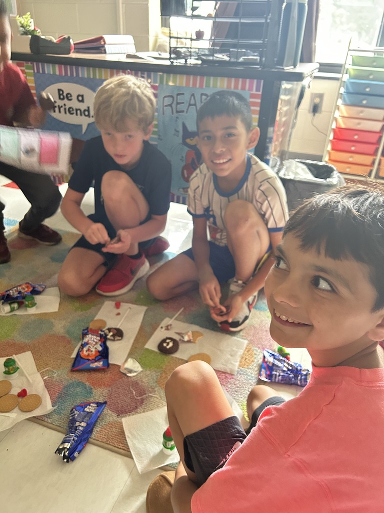 students coloring a flag