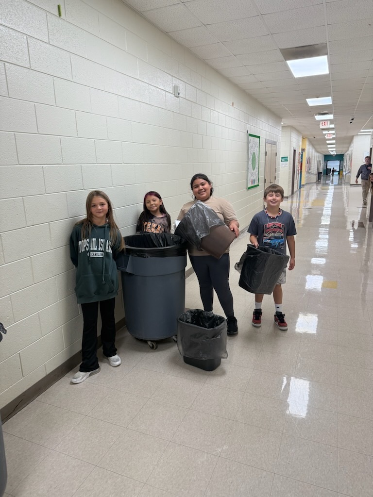SAVE Promise club taking out the trash