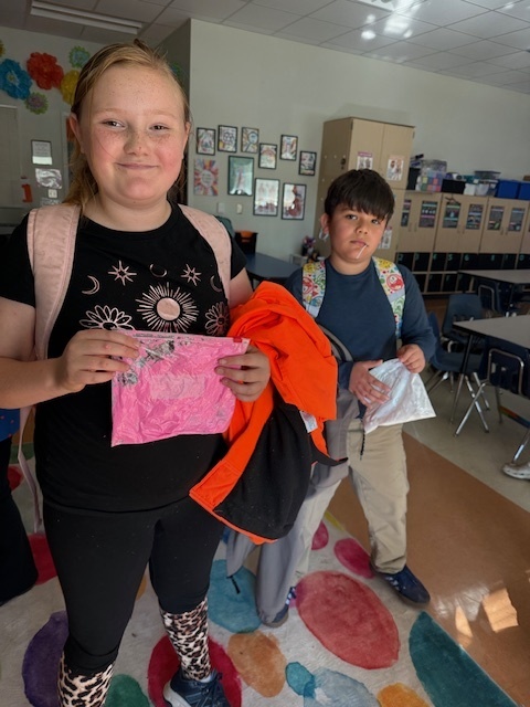 The Science Club was brewing during their October meeting. They made glow in the dark slime while learning about polymers!