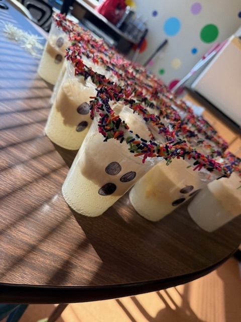 The Science Club was brewing during their October meeting. They made glow in the dark slime while learning about polymers!