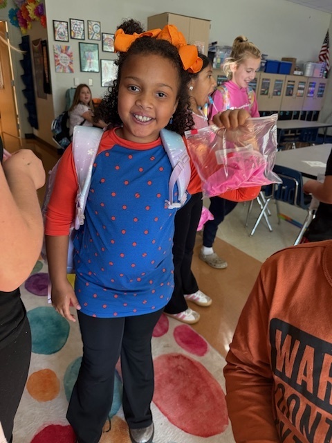 The Science Club was brewing during their October meeting. They made glow in the dark slime while learning about polymers!