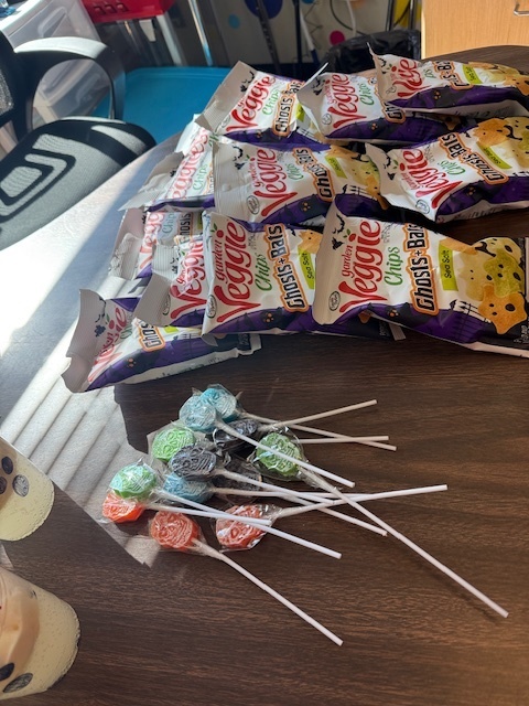 The Science Club was brewing during their October meeting. They made glow in the dark slime while learning about polymers!