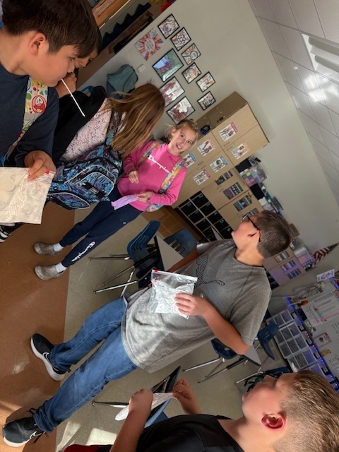 The Science Club was brewing during their October meeting. They made glow in the dark slime while learning about polymers!