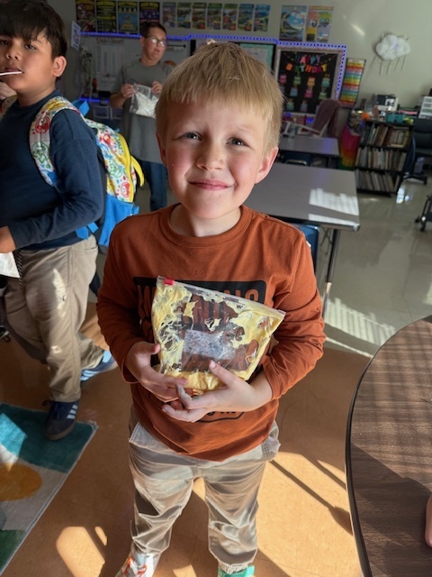 The Science Club was brewing during their October meeting. They made glow in the dark slime while learning about polymers!