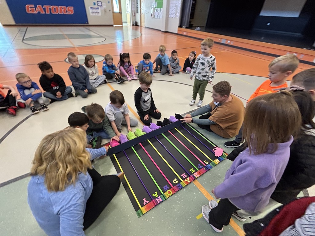 Students who sold two boxes of our chocolate candy bars had an exciting time  participating in the Pig Races!
