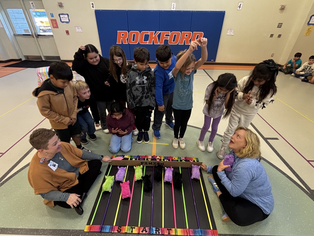 Students who sold two boxes of our chocolate candy bars had an exciting time  participating in the Pig Races!