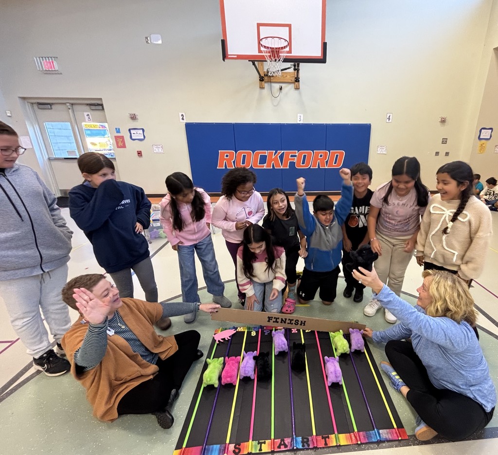 Students who sold two boxes of our chocolate candy bars had an exciting time  participating in the Pig Races!