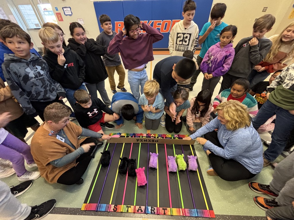 Students who sold two boxes of our chocolate candy bars had an exciting time  participating in the Pig Races!