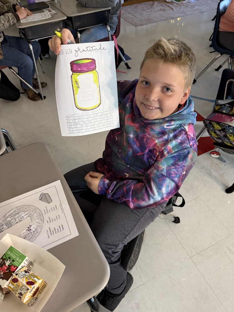 students writing gratitude notes