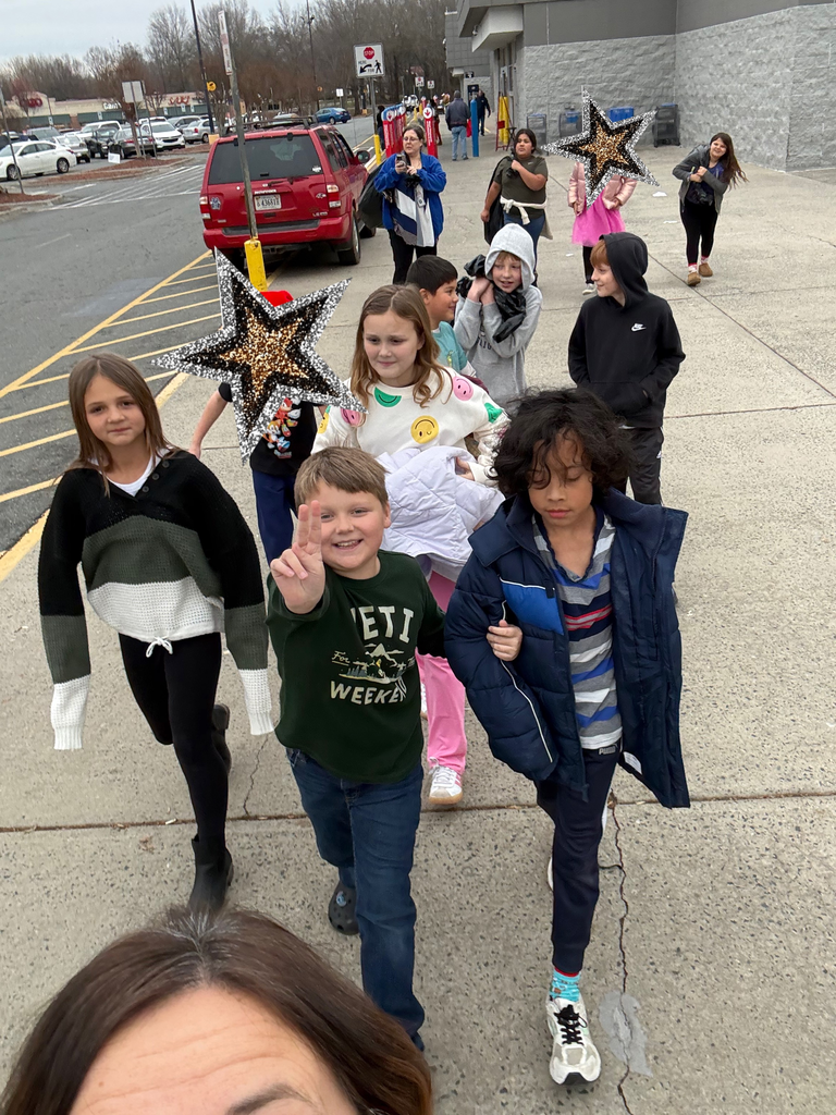 students walking through the Wal-mart parking lot